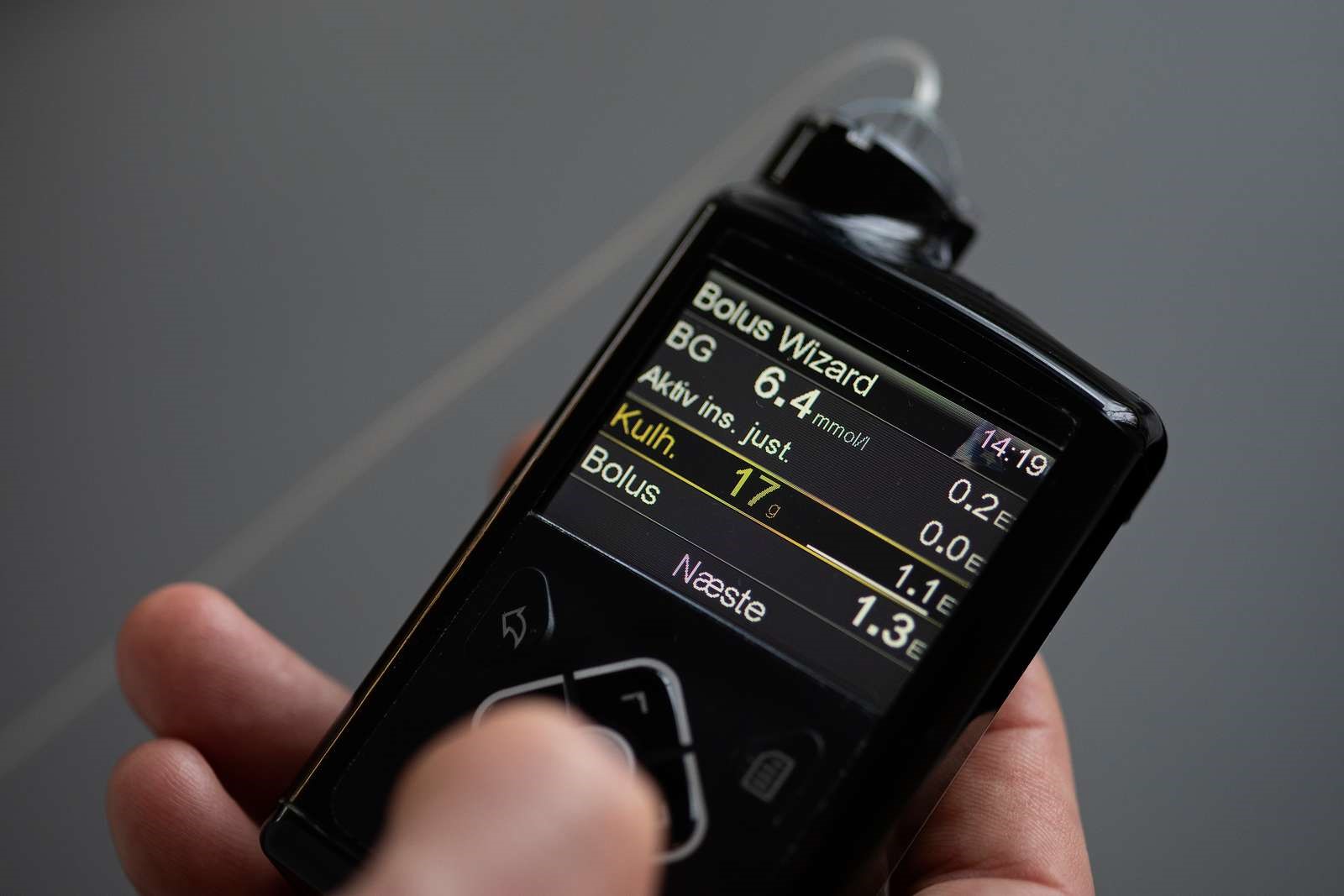 Billede af en insulinpumpe, der viser bolusinsulinmængde